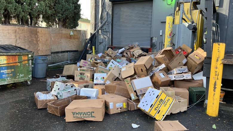 Many cardboard boxes in recycling center.