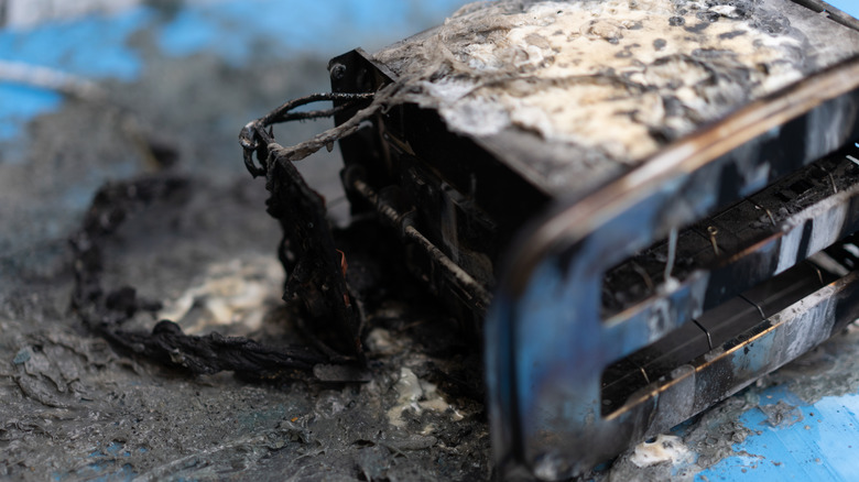 A burned toaster after a fire