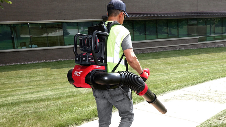 Person using Milwaukee Tools blower