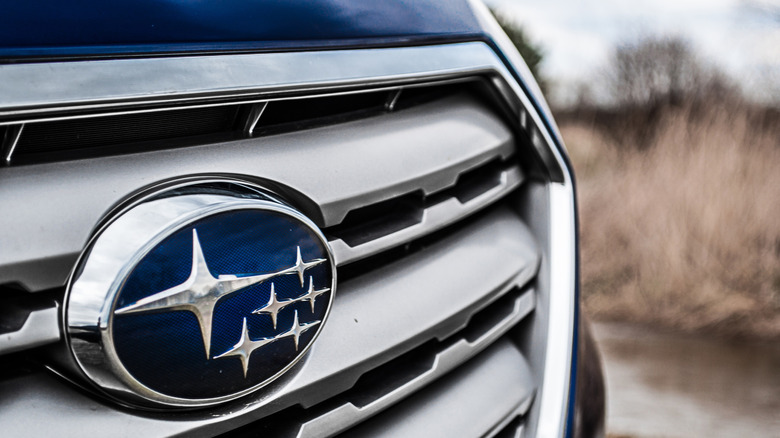 A Subaru logo in the front grill of a car
