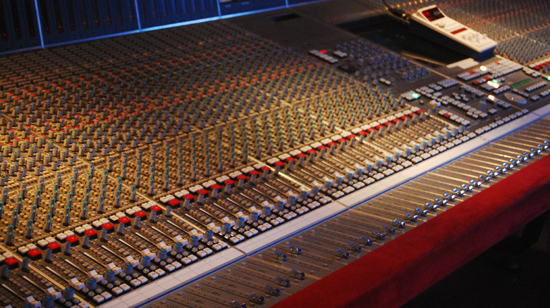 A music studio mixing board
