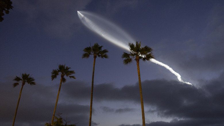 A Falcon 9 rocket carrying Starlink satellites into space