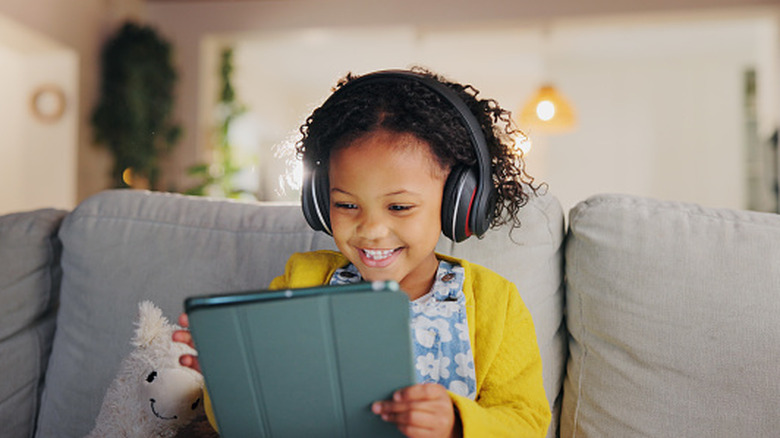 A child using an iPad