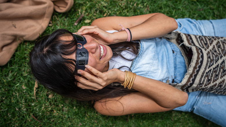 Person watching a solar eclipse