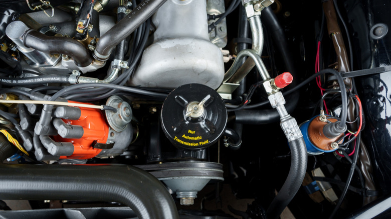 Automatic transmission fluid tank in a car