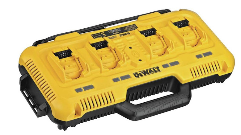 A DeWalt charging station with multiple outlets for batteries on a white background