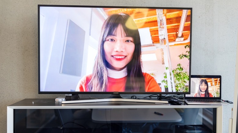 A laptop connected to a TV