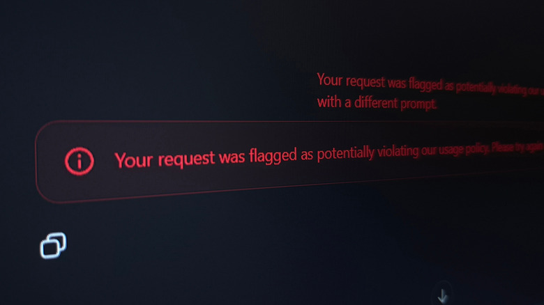 ChatGPT showing a warning about an inappropriate prompt