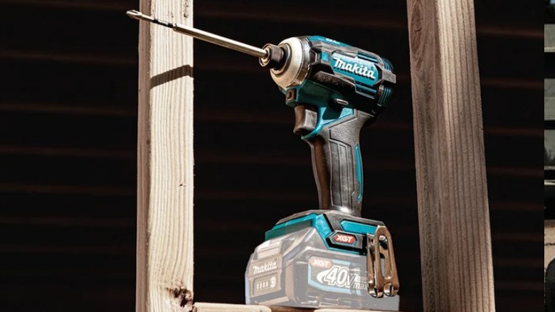 Makita impact driver on wood stud