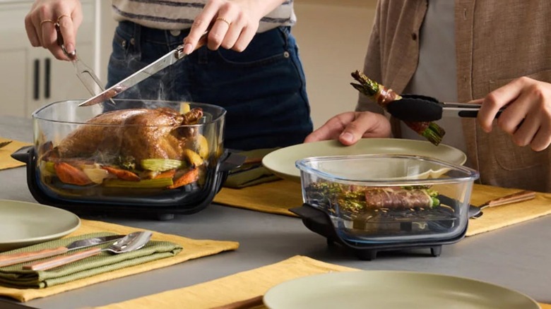 People using Ninja Crispi Air Fry Cooking System