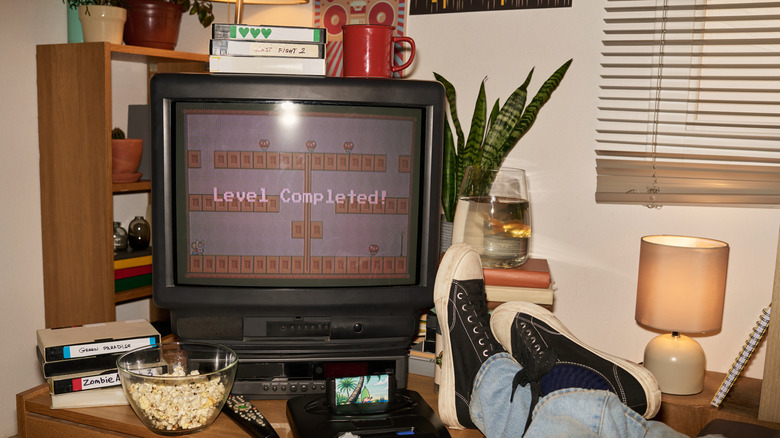 retro game displayed on an old-school TV on a desk