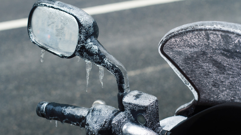 frozen motorcycle sideview mirror and dash