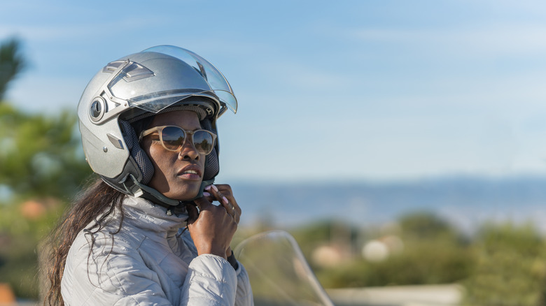 woman wearing shades and helmet