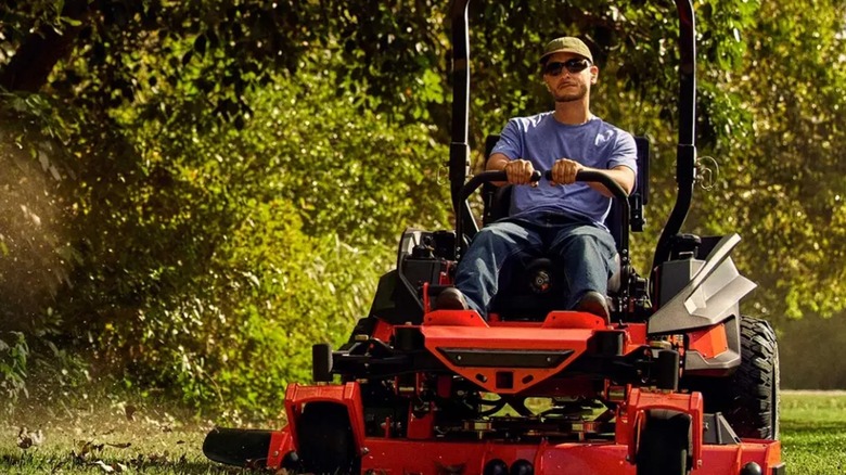 Man on Kawasaki lawn mower