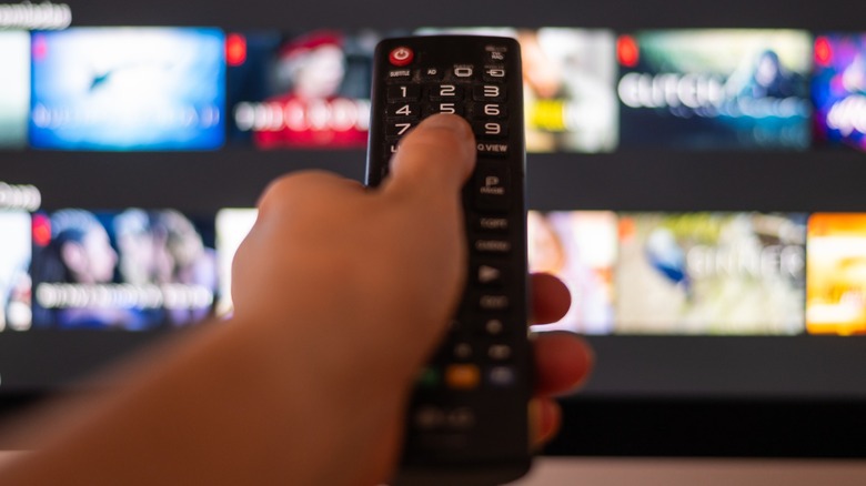 Hand Using A Television Remote Control