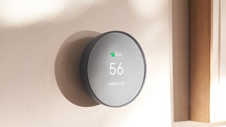 Google Nest thermostat placed on a wall