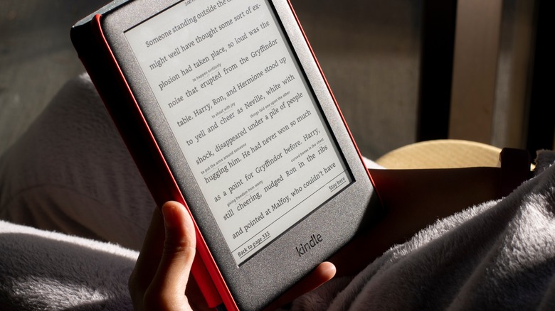 person reading on Kindle