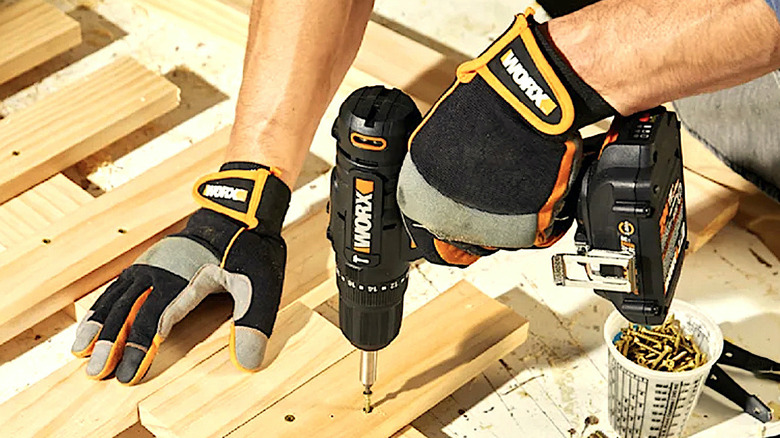 Person using Worx drill