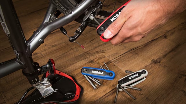 Person using Kobalt Hex Key Set on bike