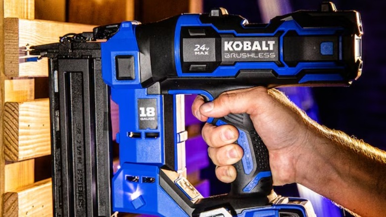 Person using Kobalt XTR 2 ⅛-inch 18-gauge Cordless Straight Brad Nailer on wood panels