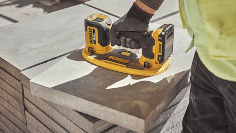 20V Max Grabo Lifter in use on concrete slab