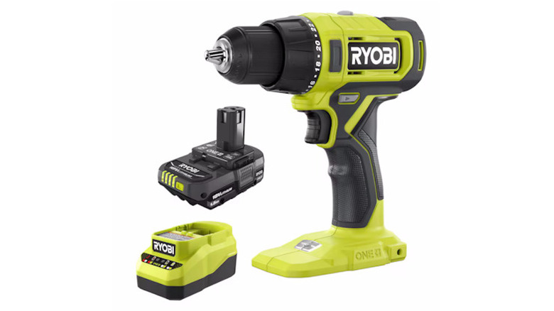 Green and black Ryobi cordless drill bit on a white background
