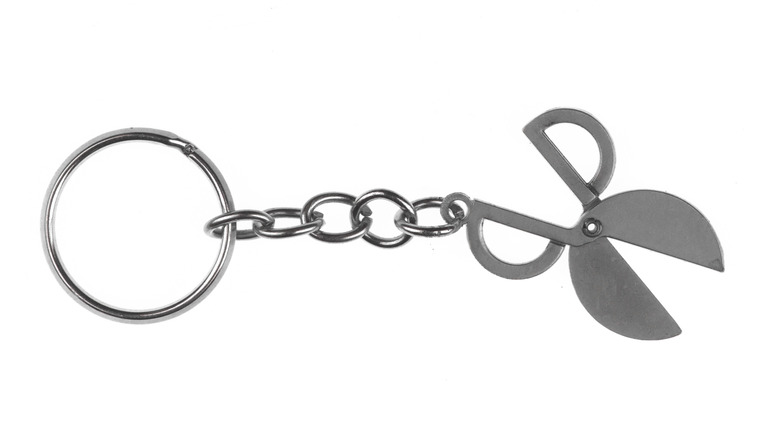 Keychain with a small pair of stylized scissors attached.