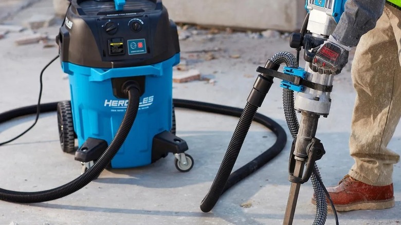 Hercules 12 Gallon OSHA-Compliant HEPA Dust Extractor used in construction site