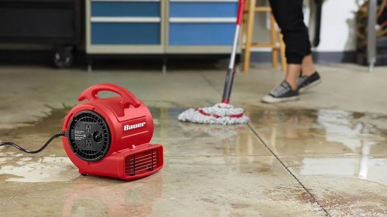 Bauer 1,000 CFM, 1/5 HP Floor Blower used to dry wet floor after mopping