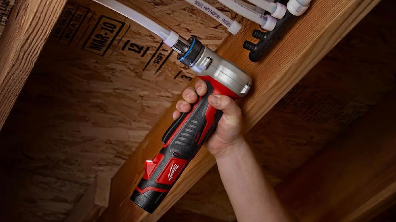 Milwaukee M12 PEX Expander in use