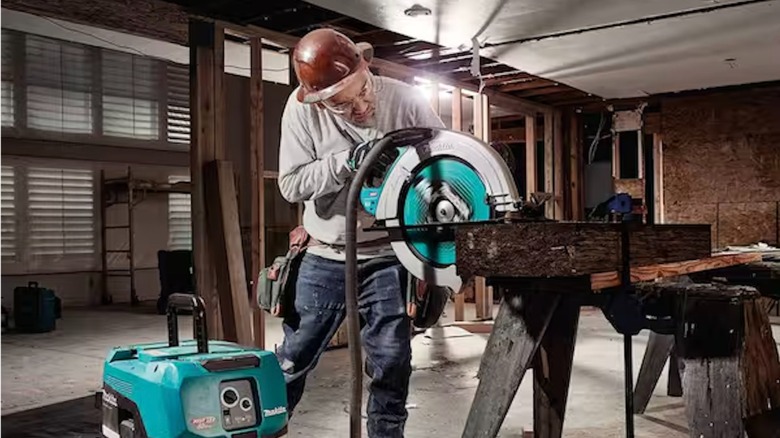 Makita 16‑5/16-inch Cordless Circular Saw in use