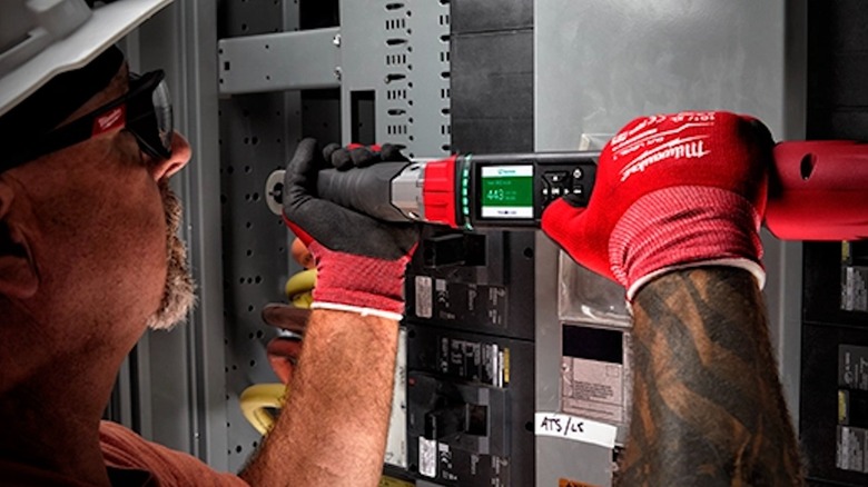 Milwaukee M12 Fuel ½-inch Digital Torque Wrench in use