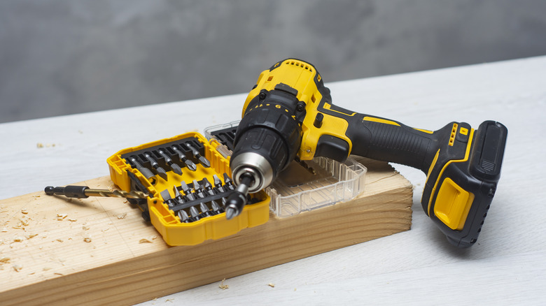 a cordless drill and drill bits