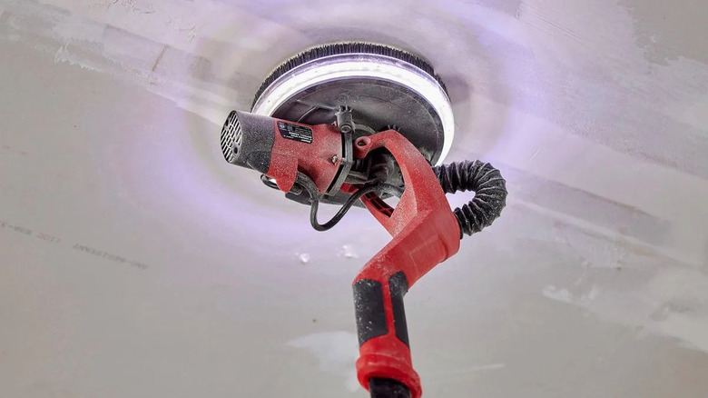 Sanding drywall with the Bauer drywall sander