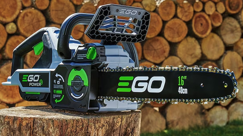 ego chainsaw on log