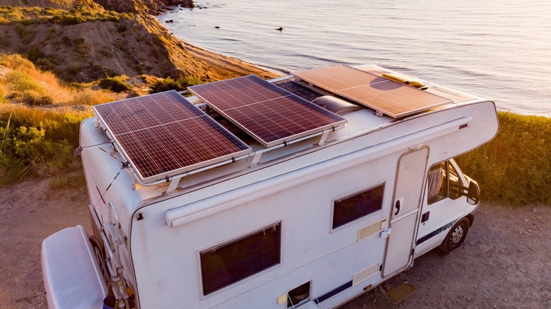 Solar panel bolted to roof of a RV