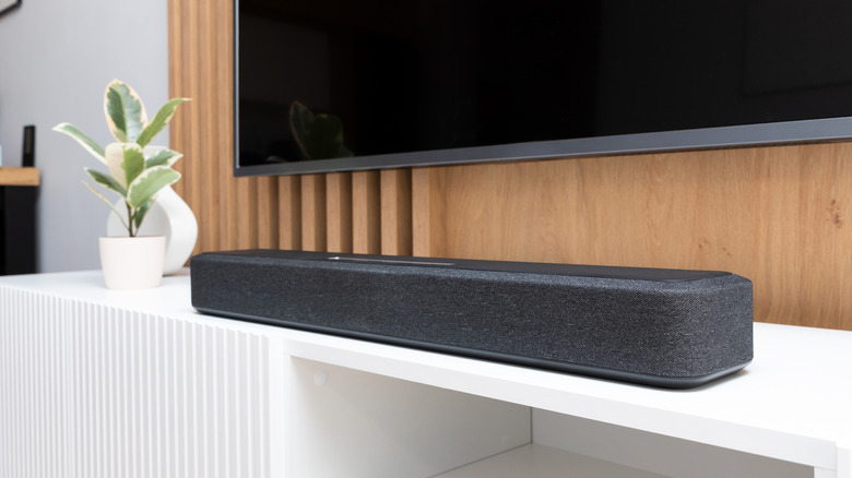 A soundbar under a TV