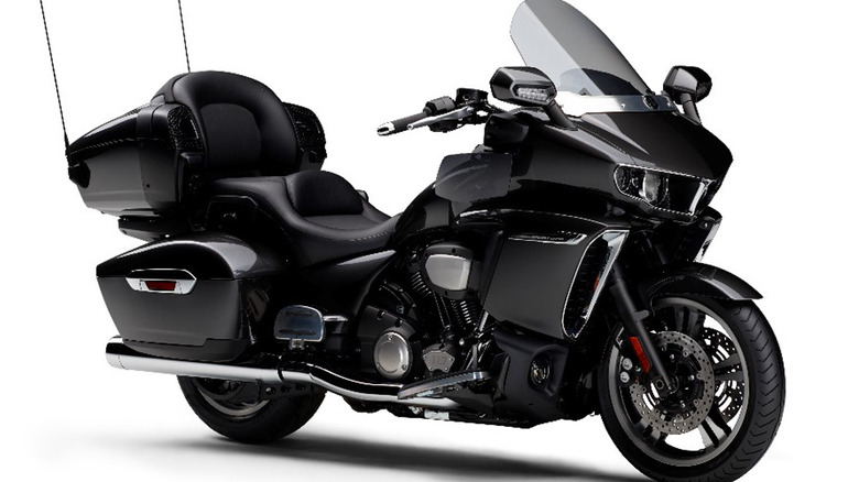 A black 2018 Yamaha Star Venture touring motorcycle photographed against a white studio background, right three-quarter view shown.