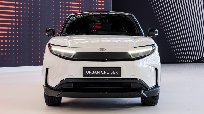 Front view of white Toyota Urban Cruiser at a car show