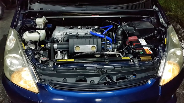 Toyota 1ZZ-FE in the engine bay of a Toyota Celica.
