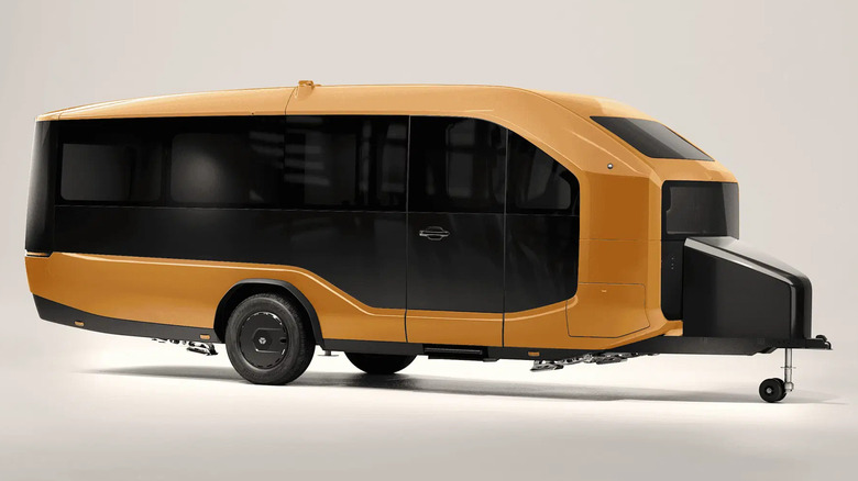 The Pebble Flow travel trailer in orange paint