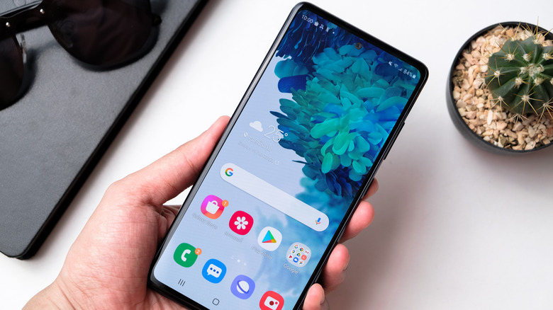 person holding an Android phone
