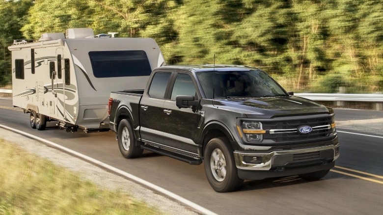 A Ford-150 towing an RV
