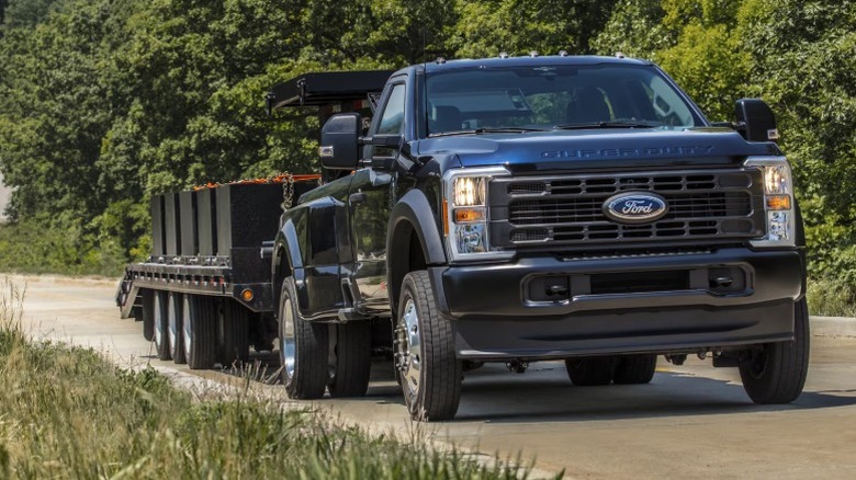 A Ford F-450 Super Duty truck pulling a trailer