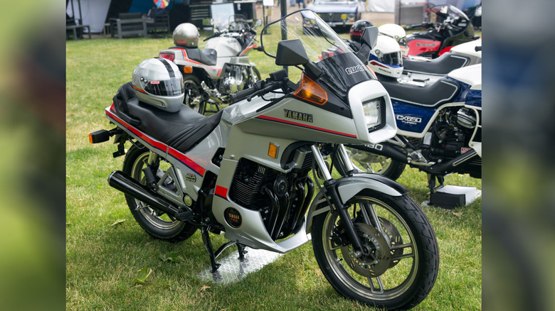 Yamaha XJ650 Seca Turbo being displayed at an outdoor motorcycle show.