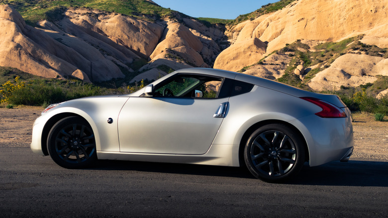 A silver 2020 Nissan 370Z parked by rocks