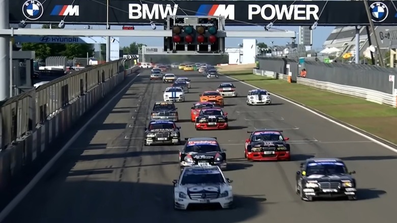 Front-on image of Tourenwagen Legenden Nurburgring grid at green flag