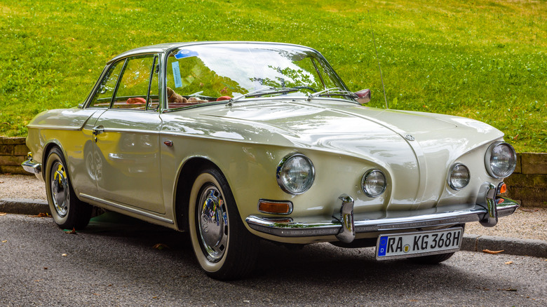 Front 3/4 view of Type 34 Karmann Ghia parked on street