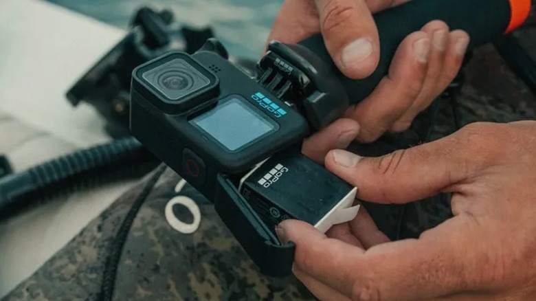 Person inserting Enduro battery