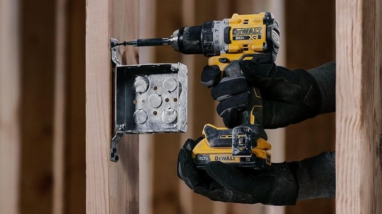 person using DeWalt Cordless Drill/Driver on wood